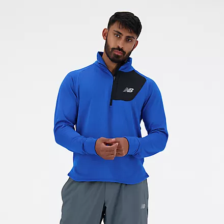 NEW BALANCE ESSENTIALS HEAT GRID HALF ZIP BLUE